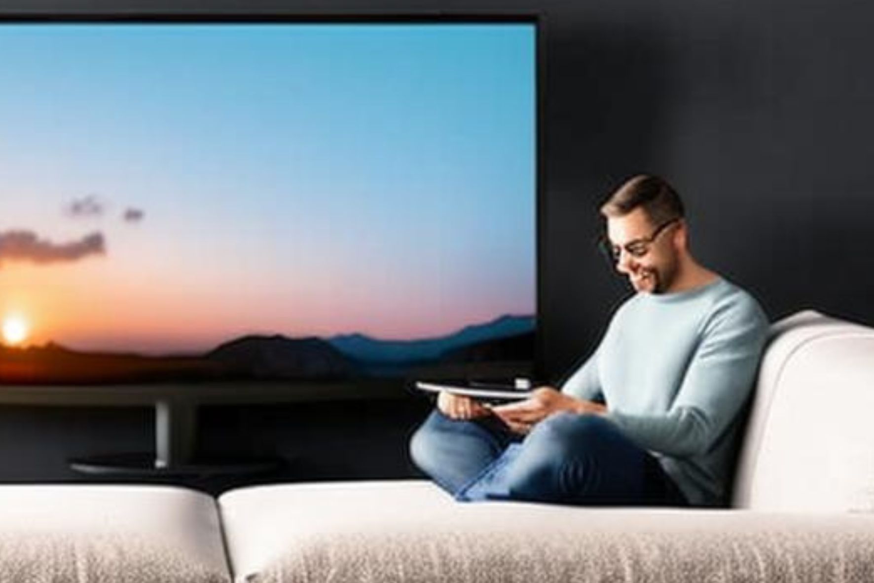 Man in living room watching tv